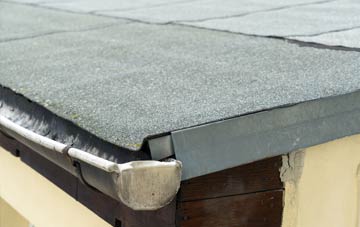 repair or replace Burnedge flat roofing?
